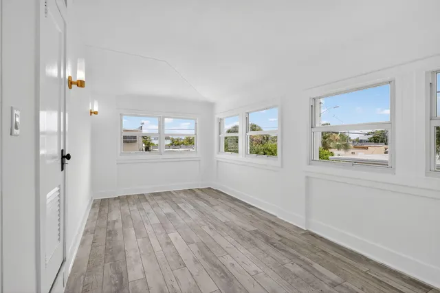 an empty room with windows