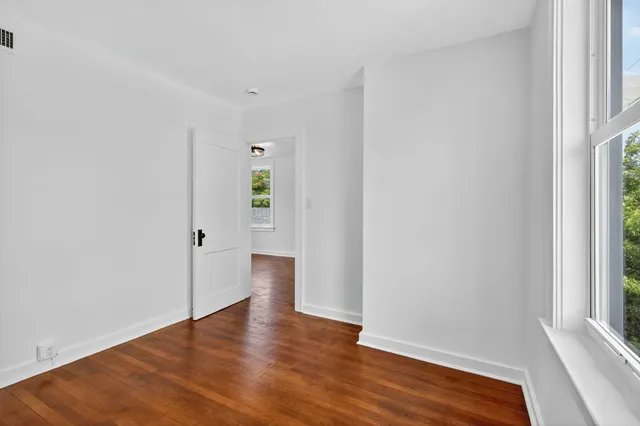 an empty room with window