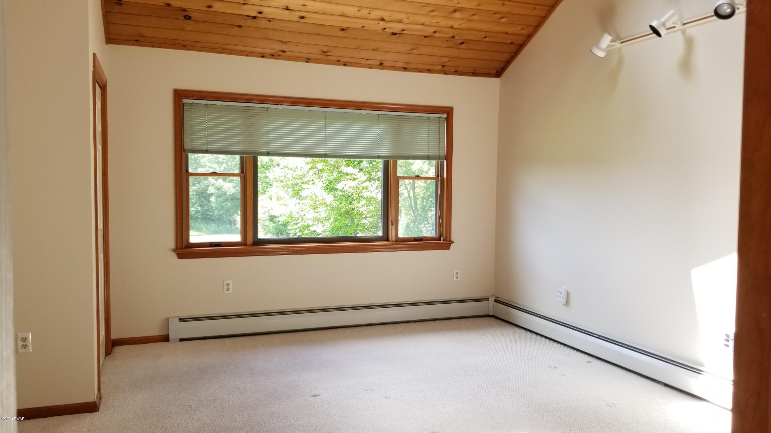 327 Wescott Road Tyler Hill, PA 18469 - Photo 20 of 37 Master with cathedral wood ceiling