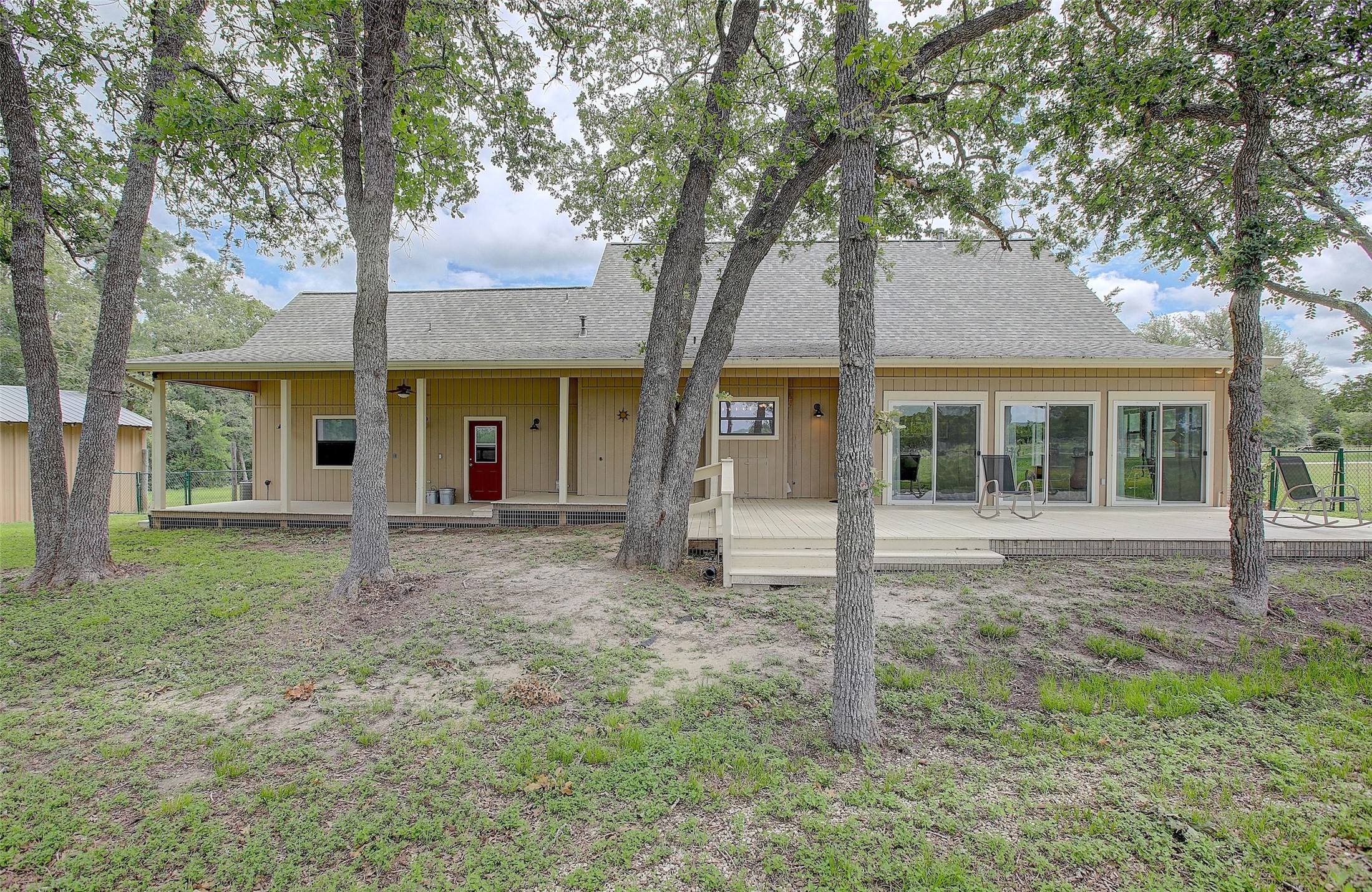 1928 Koether Road Carmine, TX 78932 - Photo 6 of 49 Main home back deck with numerous trees, fencing for your home pets and plenty of room for growth