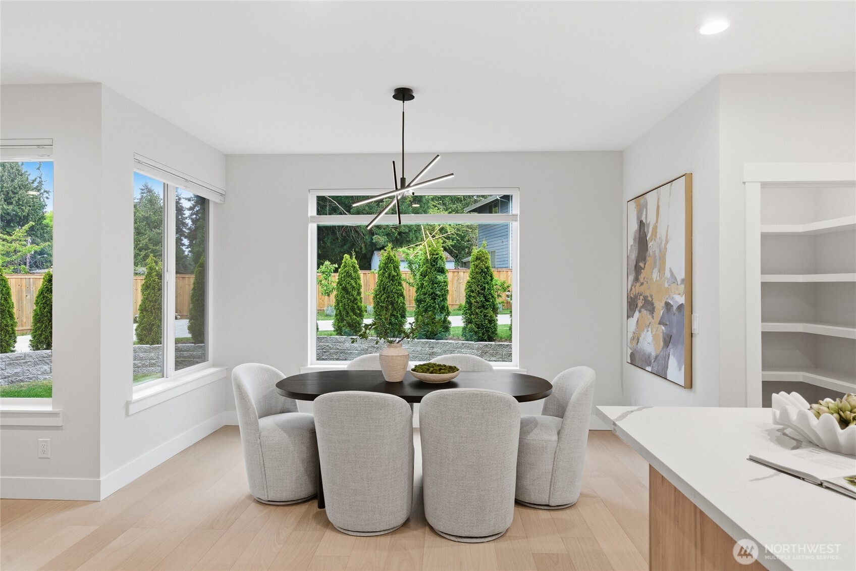 719 Edmonds Way Edmonds, WA 98020 - Photo 15 of 40 a living room with furniture and a chandelier