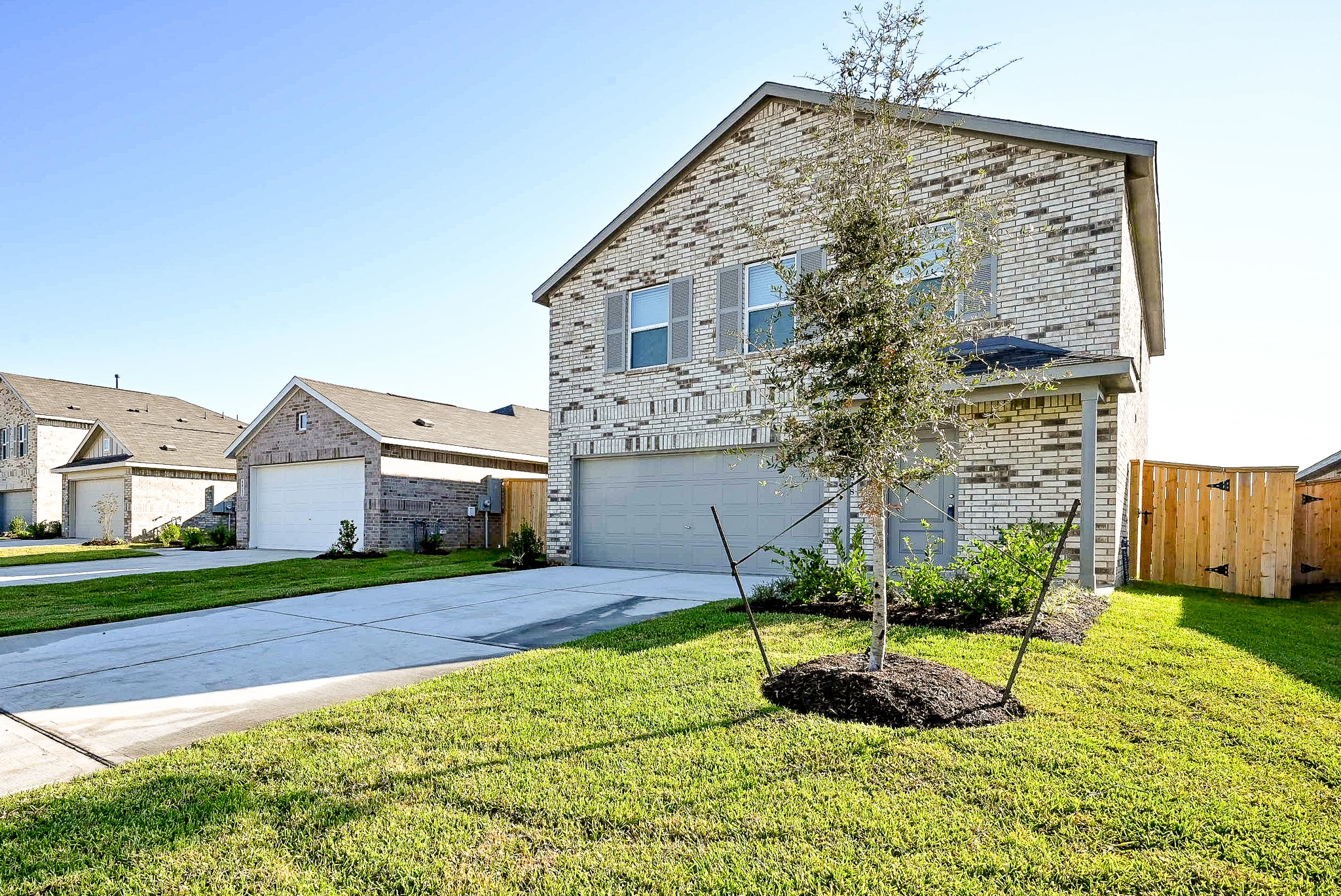 6818 Flowering Ginger Lane Katy, TX 77493 - Photo 15 of 47 a view of a front of a house with a yard