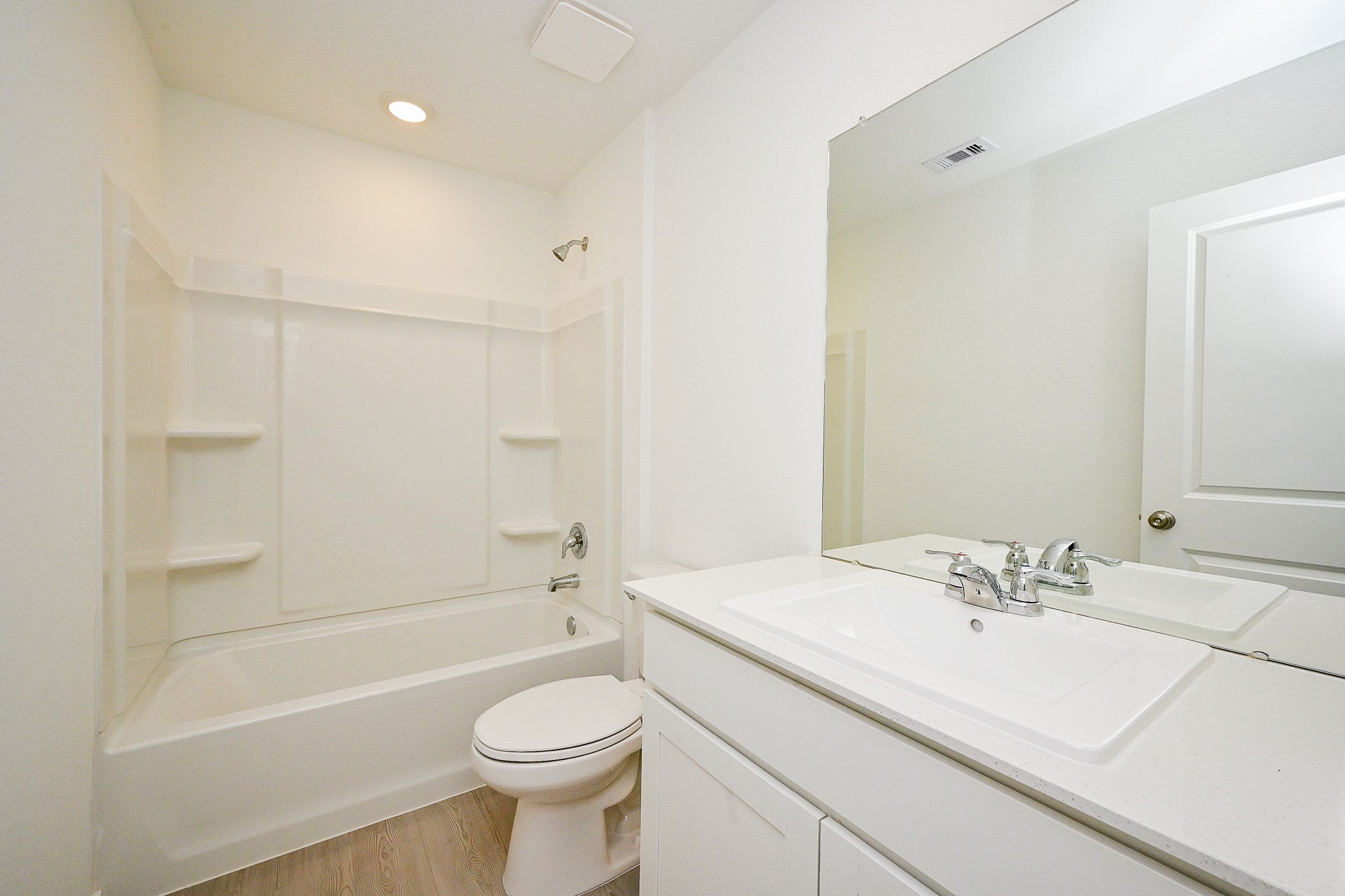 6818 Flowering Ginger Lane Katy, TX 77493 - Photo 30 of 47 a bathroom with a sink a toilet and a bathtub