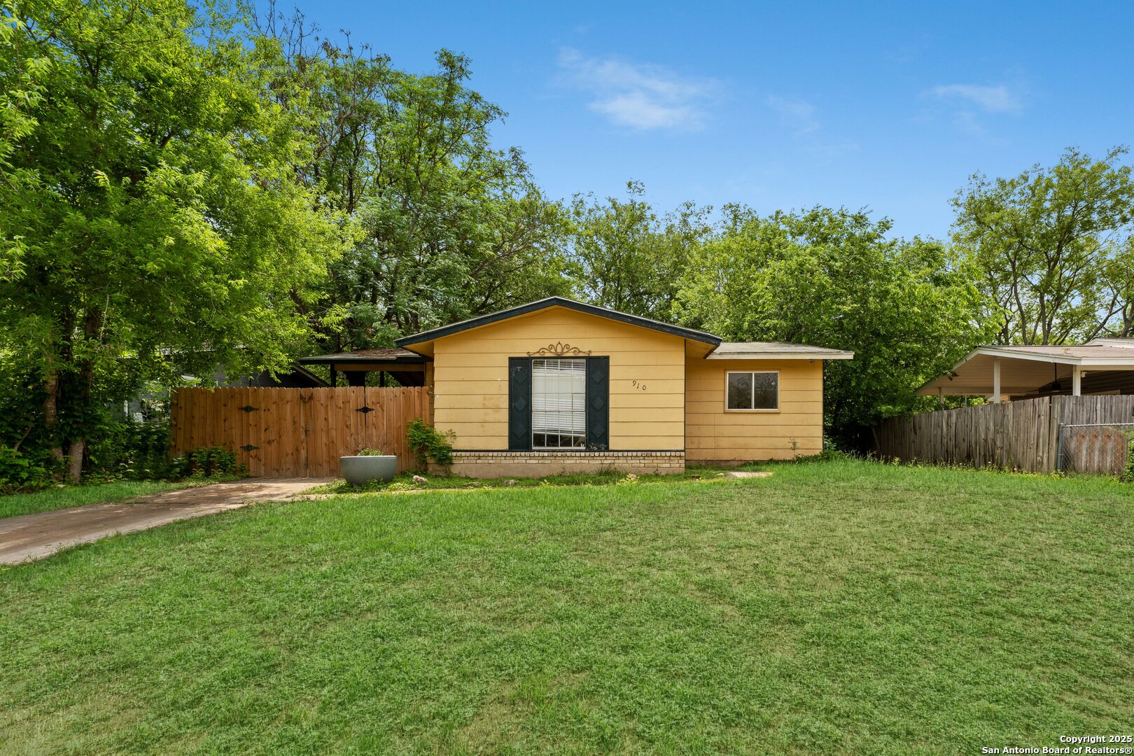 910 Crestfield Drive San Antonio, TX 78227 - Photo 1 of 1 a house view with a garden space