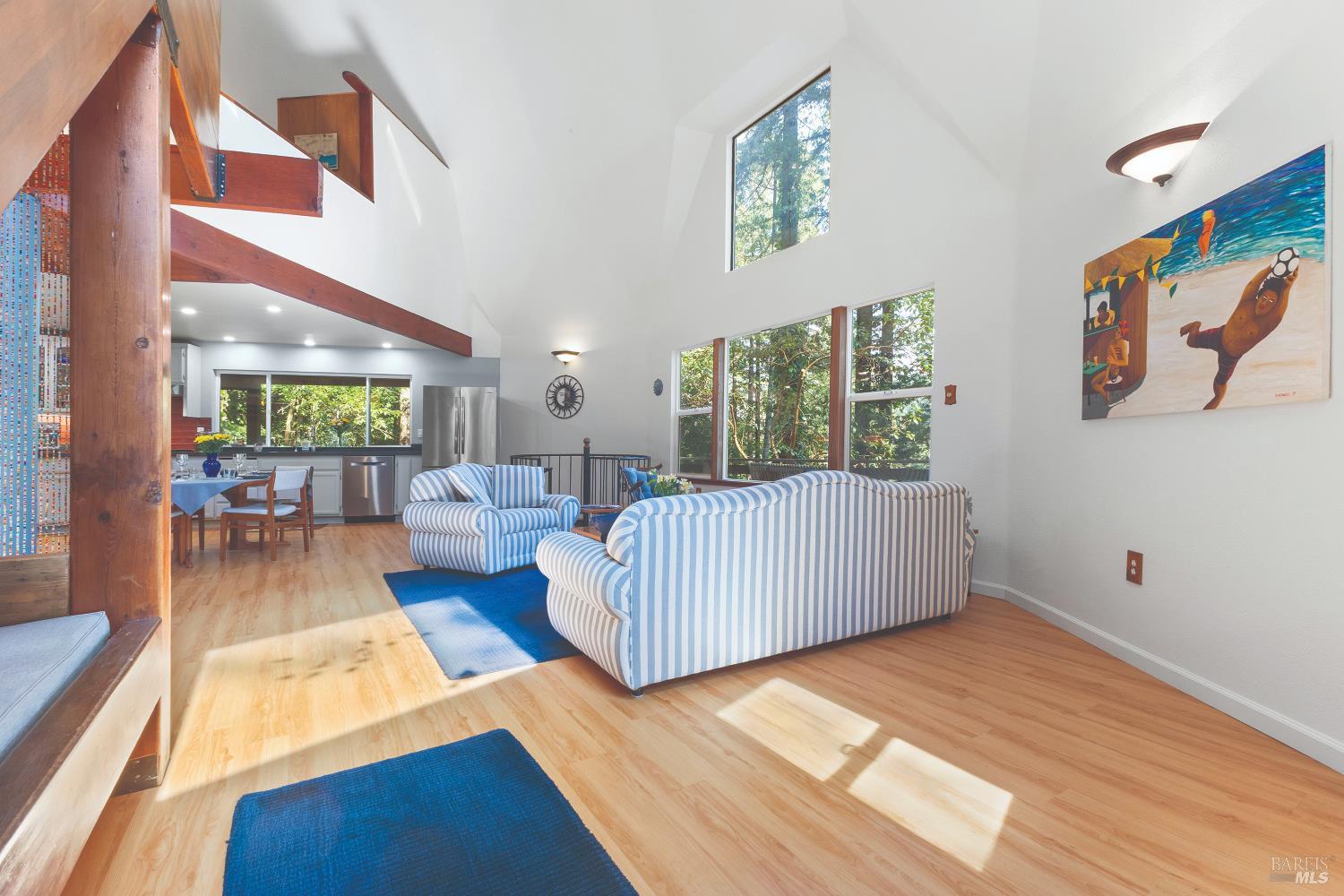 9085 Middle Terrace Monte Rio, CA 95462 - Photo 11 of 77 a living room with furniture and a rug