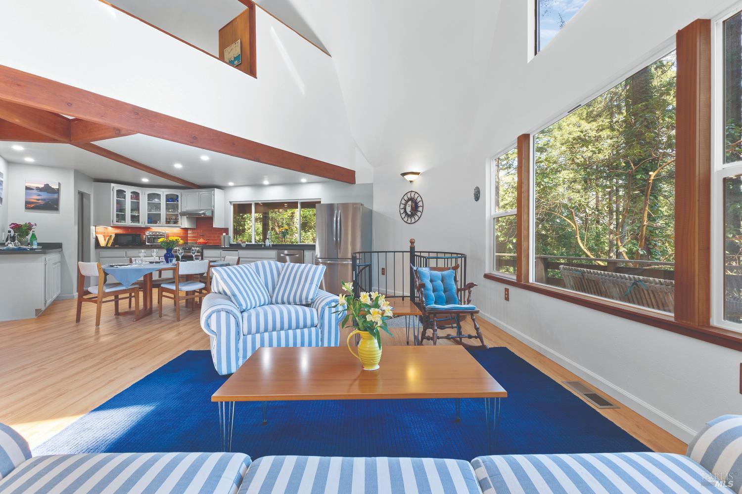 9085 Middle Terrace Monte Rio, CA 95462 - Photo 19 of 77 a living room with furniture and a large window