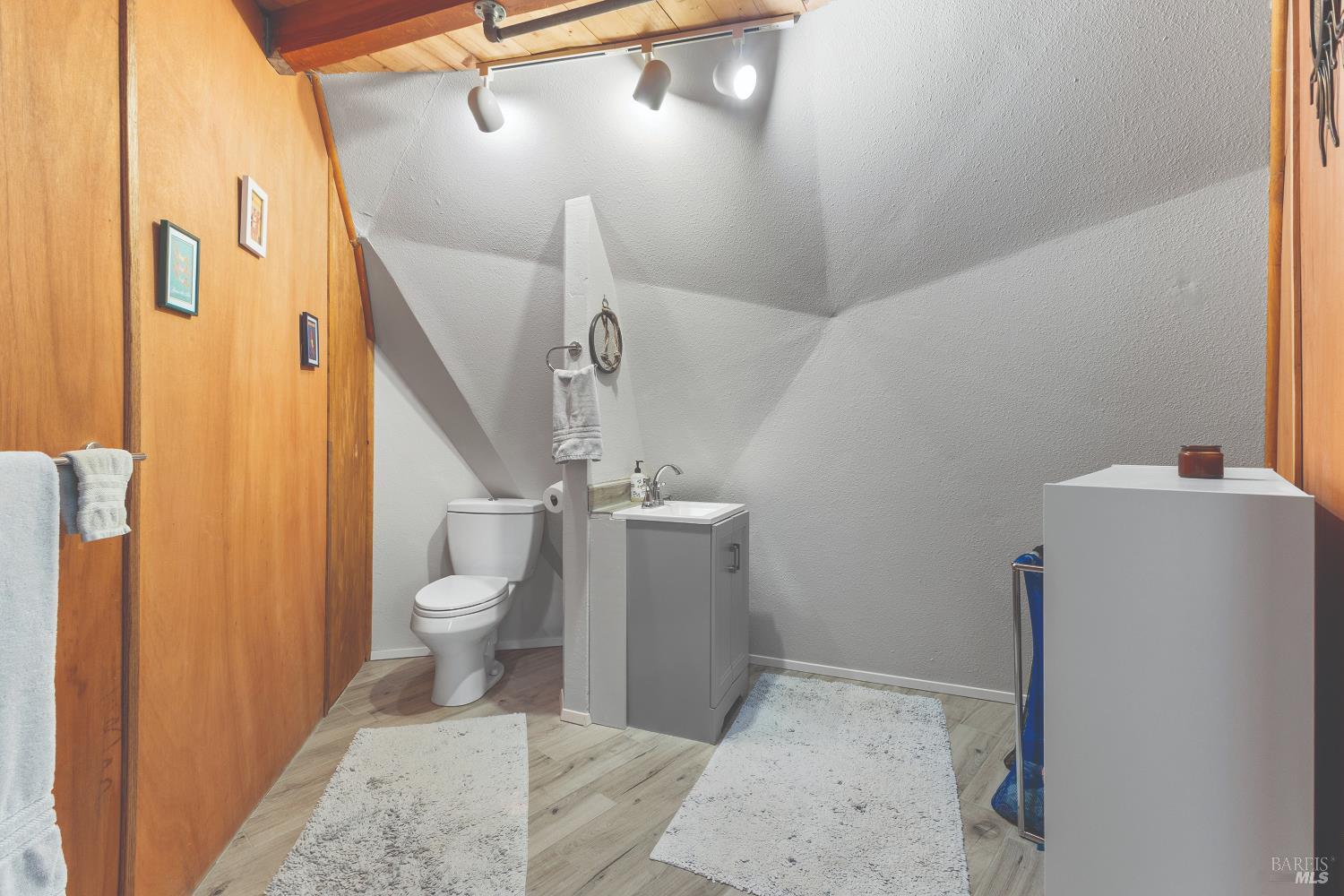 9085 Middle Terrace Monte Rio, CA 95462 - Photo 30 of 77 a bathroom with a toilet and a sink