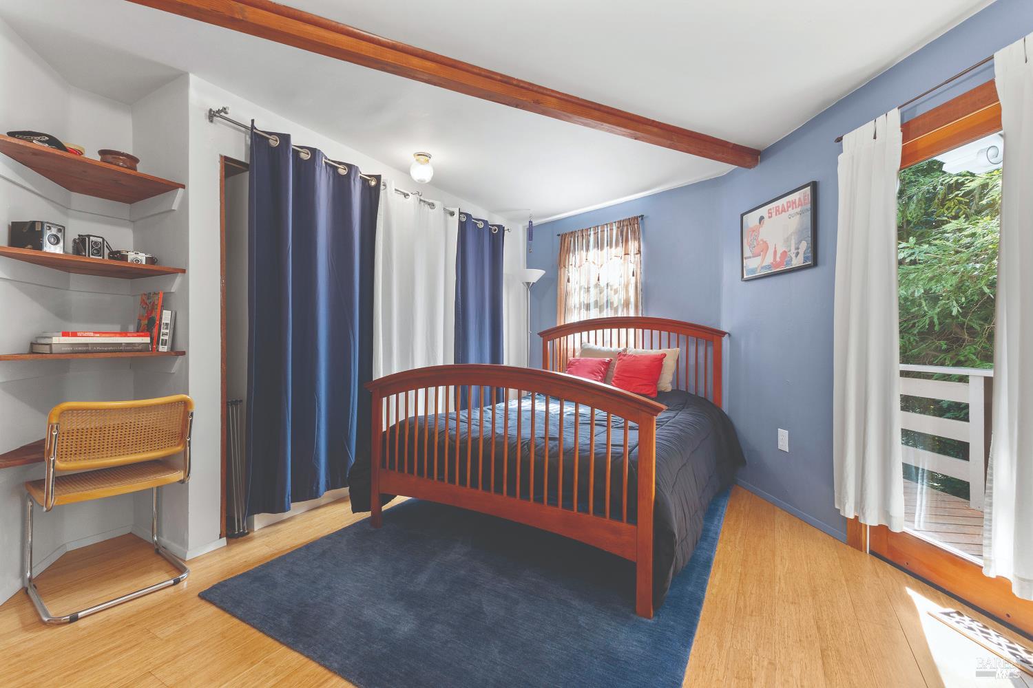 9085 Middle Terrace Monte Rio, CA 95462 - Photo 31 of 77 a bedroom with furniture and a window