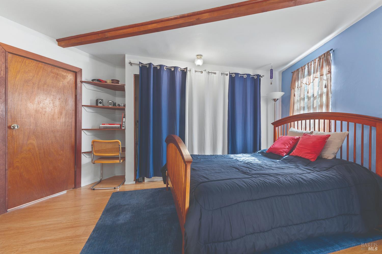 9085 Middle Terrace Monte Rio, CA 95462 - Photo 32 of 77 a bedroom with a bed and a window