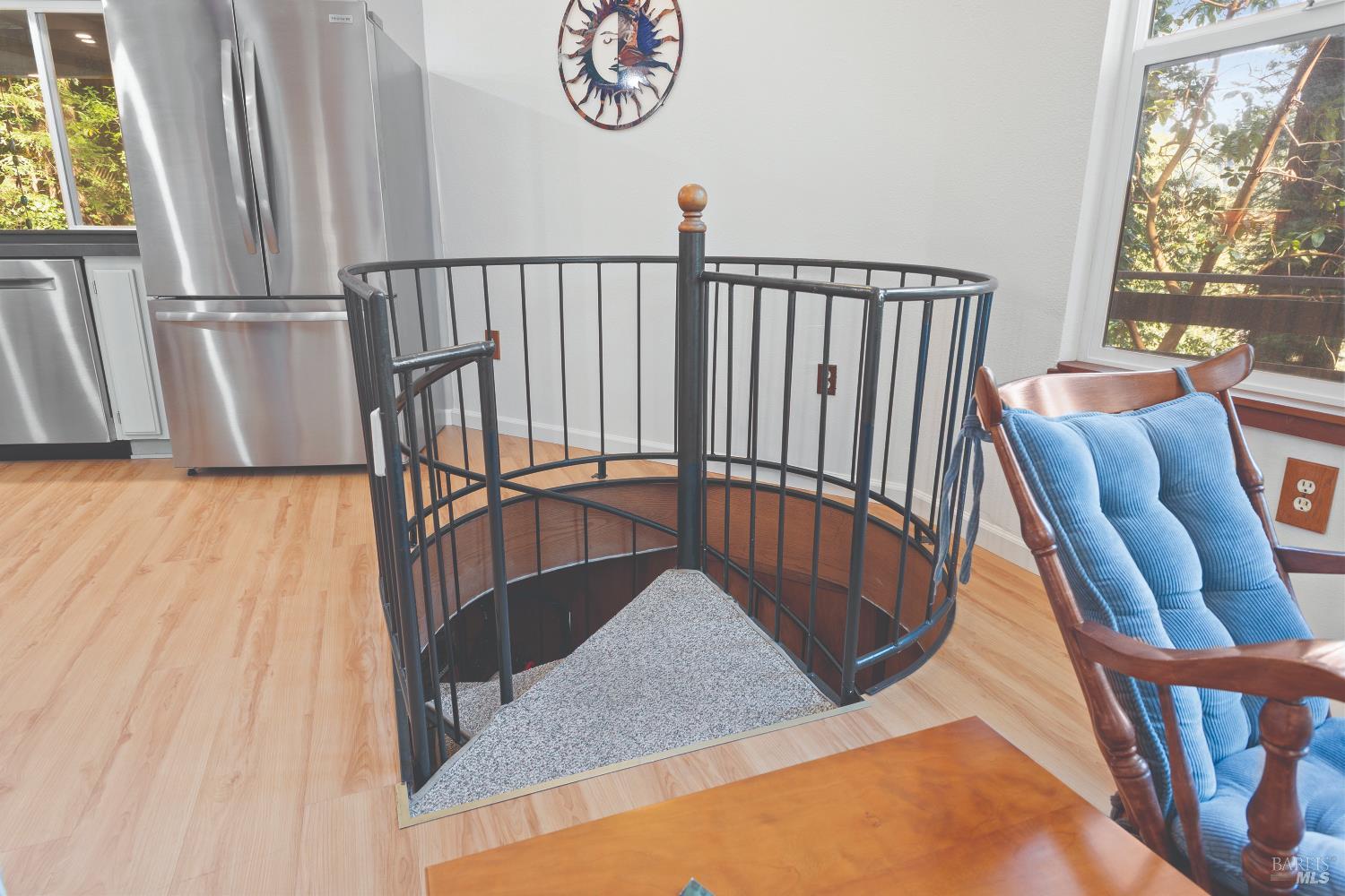 9085 Middle Terrace Monte Rio, CA 95462 - Photo 41 of 77 a view of a hallway with wooden floor and furniture