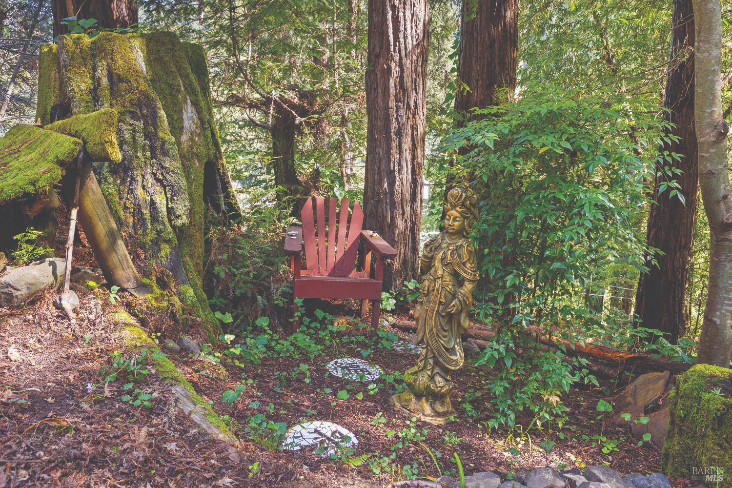 9085 Middle Terrace Monte Rio, CA 95462 - Photo 52 of 77 a view of a house with a yard and sitting area