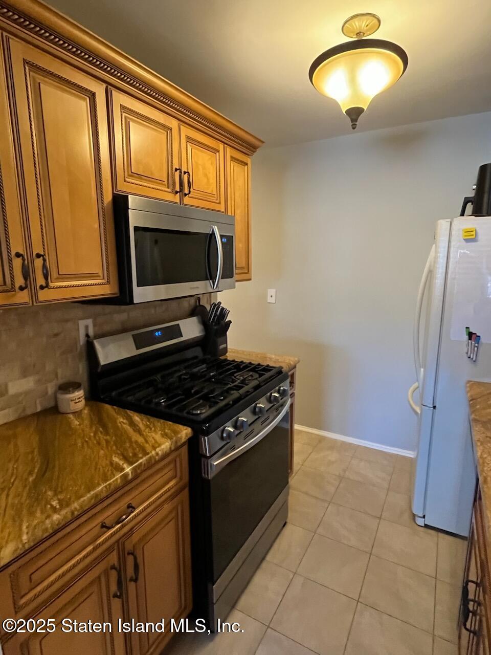 1100 Clove Road, Unit 2E Staten Island, NY 10301 - Photo 13 of 37 Galley Kitchen
