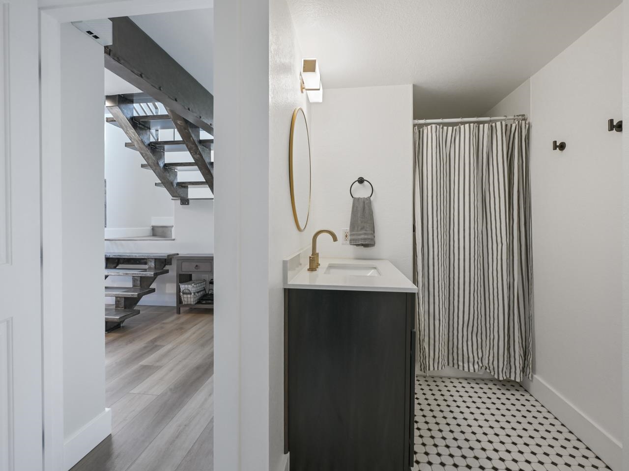 383 Explorer Court, Unit B Grand Junction, CO 81507 - Photo 30 of 40 a bathroom with a sink and a mirror