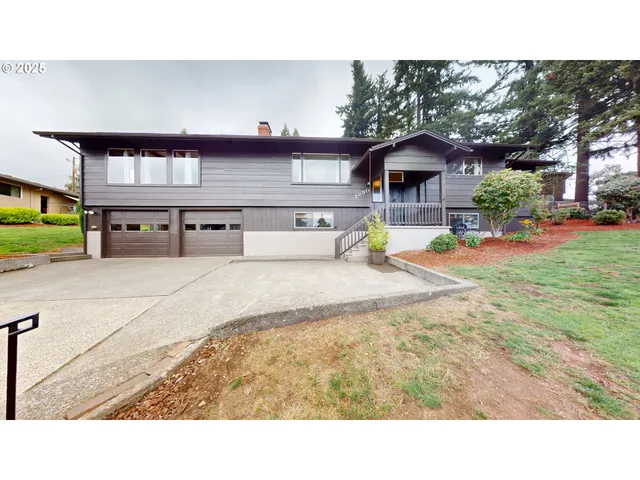 a black and white photo of a house