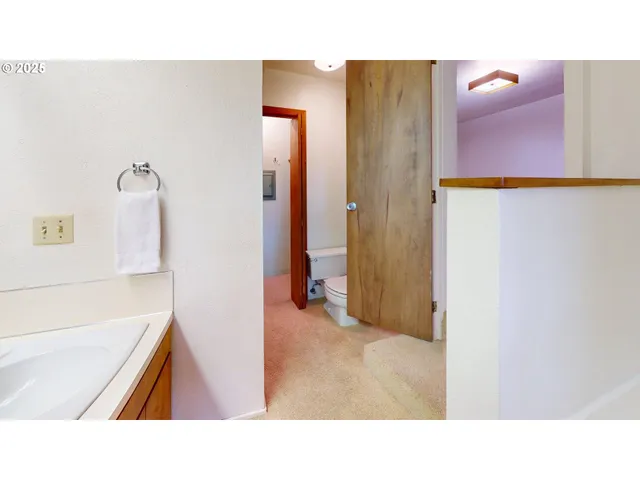 view of an empty room with wooden floor