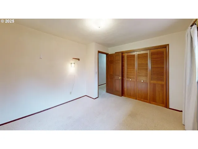 a living room with furniture and window