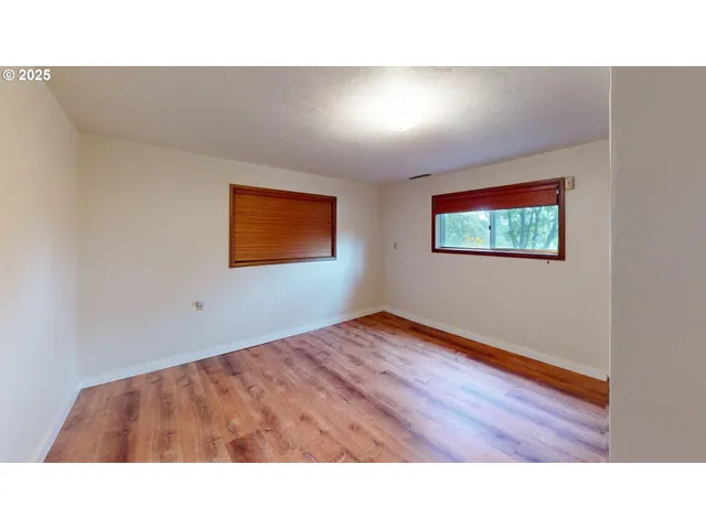 view of an empty room with a window