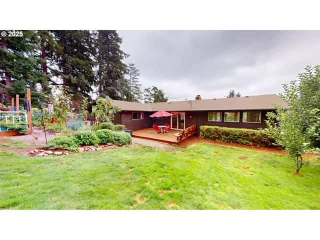 a bathroom with a double vanity sink mirror and shower