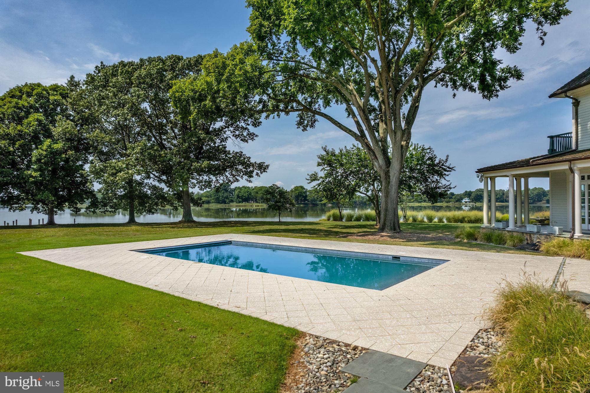 8620 Bozman Neavitt Road St. Michaels, MD 21663 - Photo 21 of 60 a view of outdoor space yard swimming pool and patio