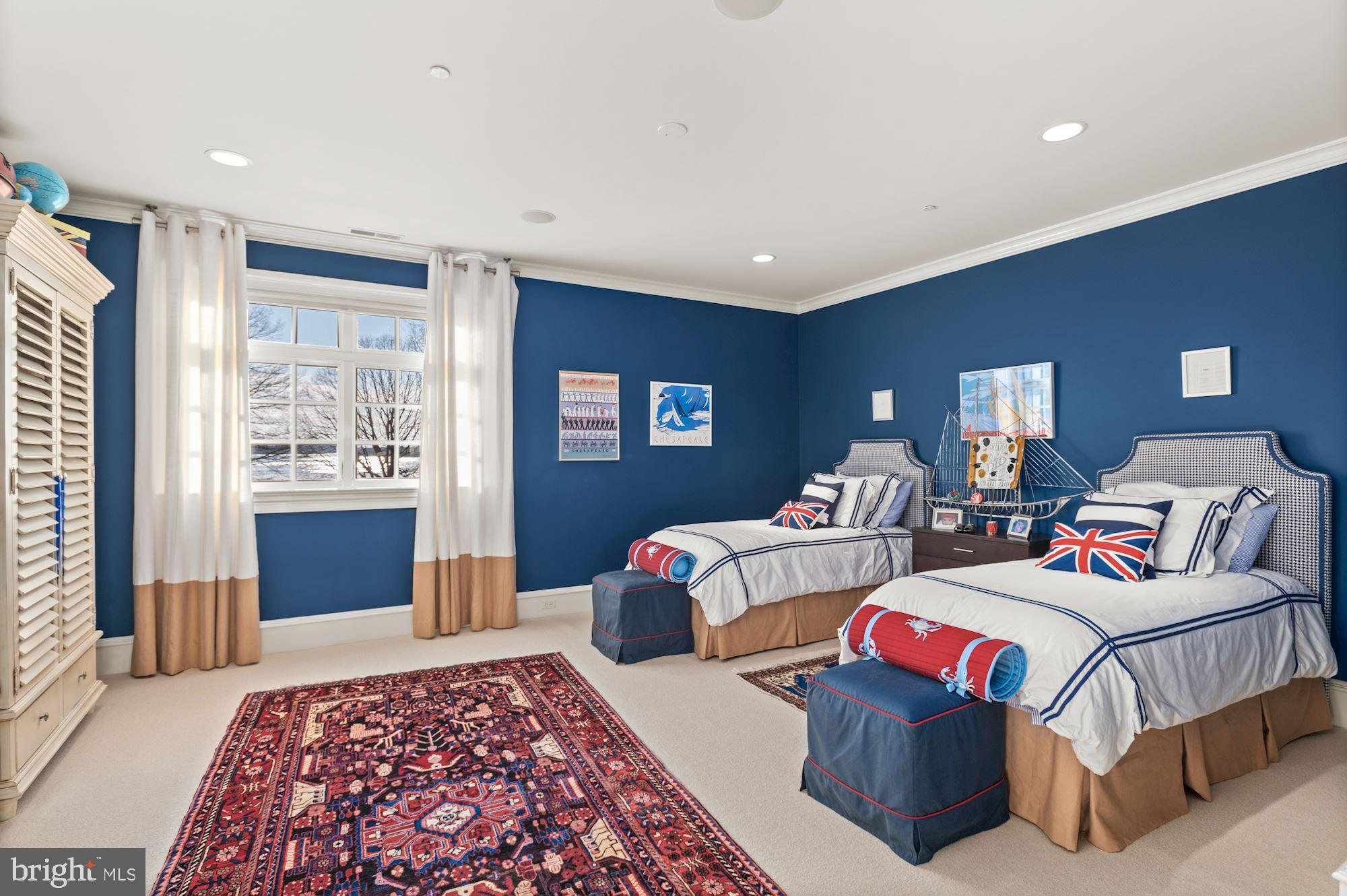 8620 Bozman Neavitt Road St. Michaels, MD 21663 - Photo 33 of 60 a bedroom with bed and a window