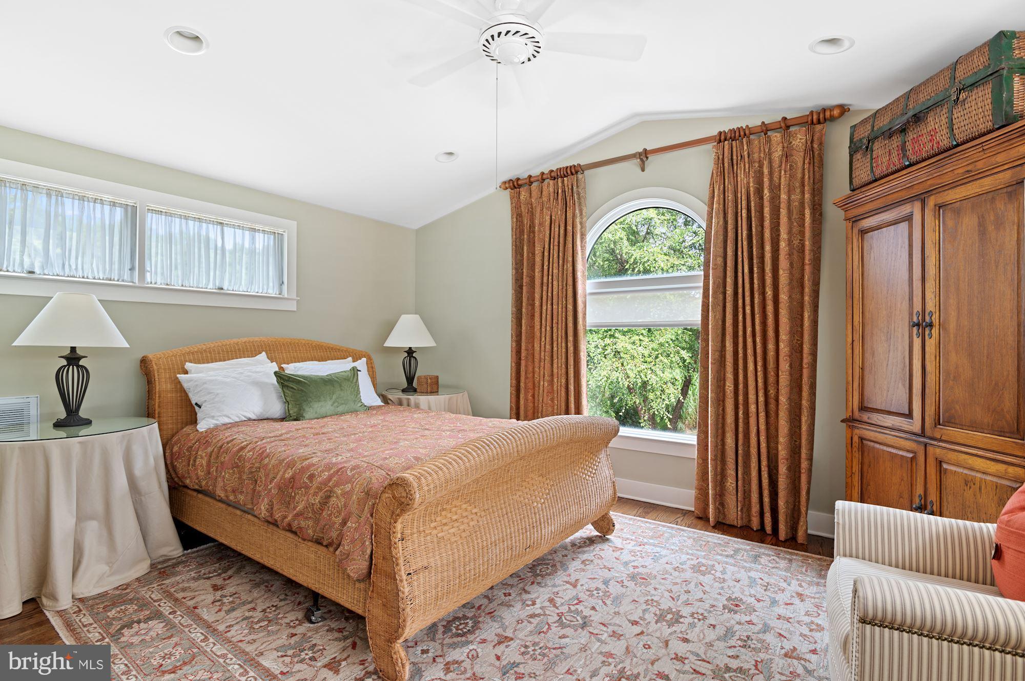 8620 Bozman Neavitt Road St. Michaels, MD 21663 - Photo 49 of 60 a bedroom with a bed and a window