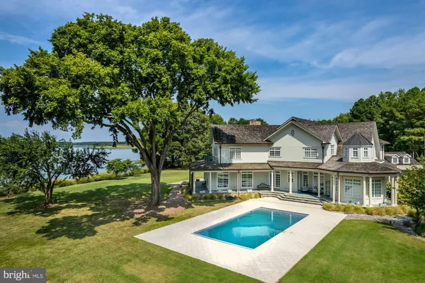a view of outdoor space yard swimming pool and green space