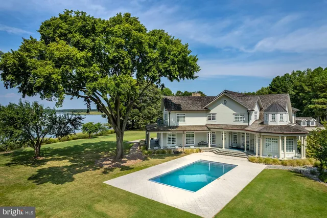 a view of outdoor space yard swimming pool and green space