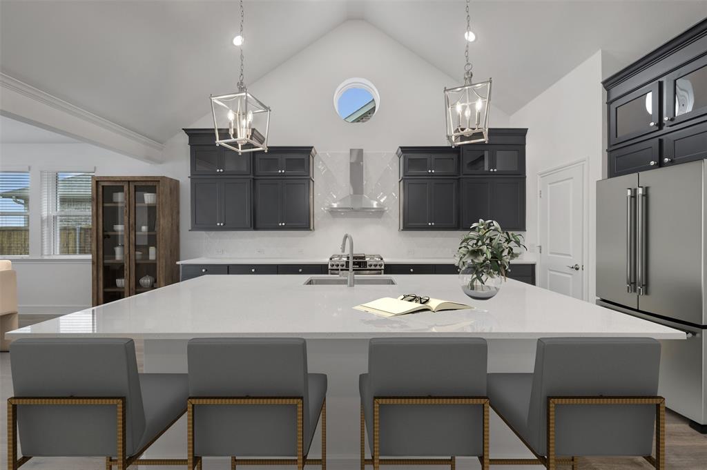 1004 Ashcroft Lane Justin, TX 76247 - Photo 5 of 39 a kitchen with a table chairs stove and refrigerator