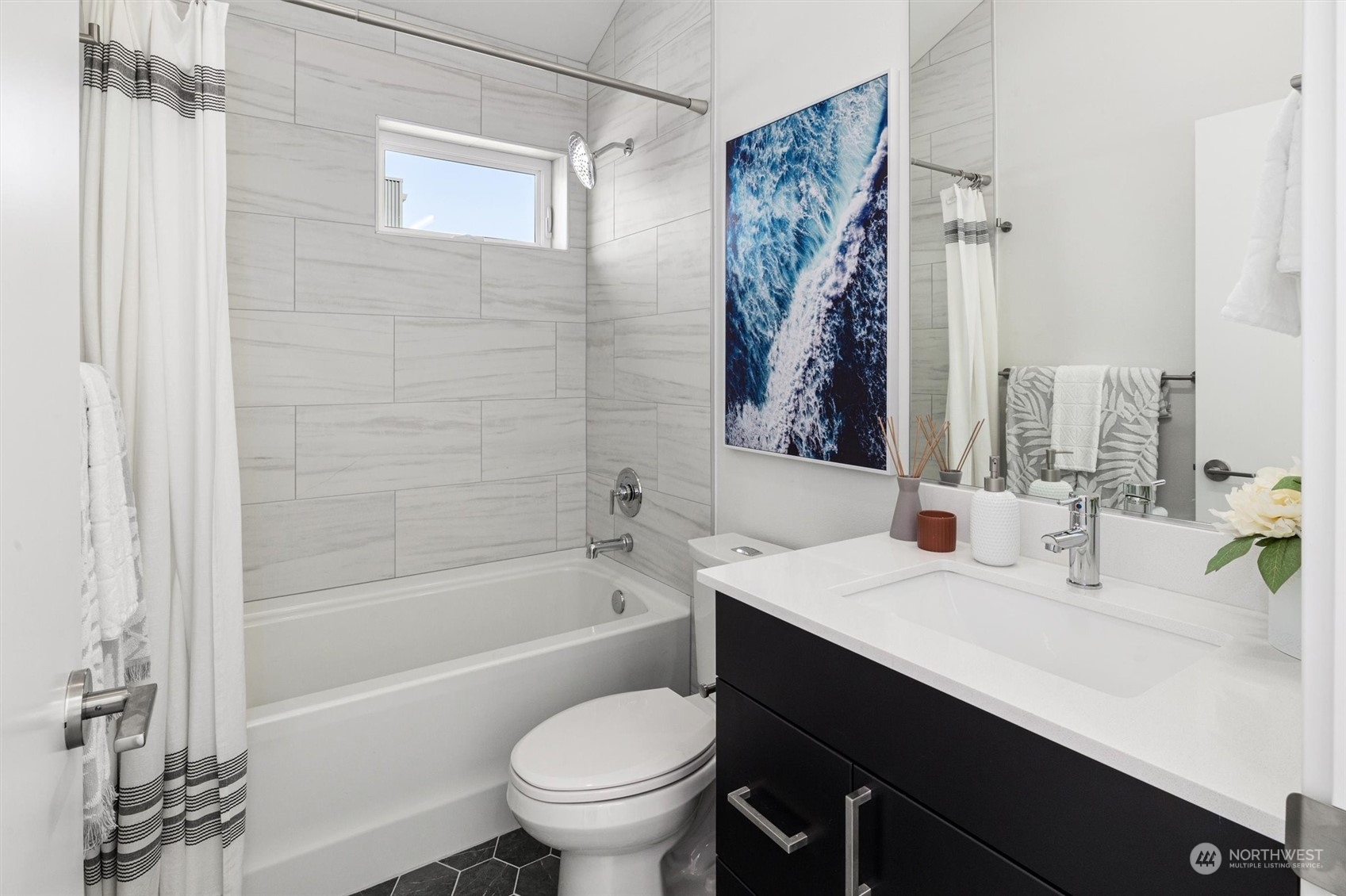 2203 22nd Avenue South Seattle, WA 98144 - Photo 15 of 21 a bathroom with a sink a toilet and a bathtub