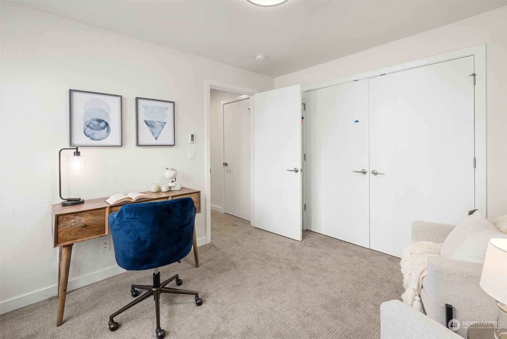 2203 22nd Avenue South Seattle, WA 98144 - Photo 20 of 21 a workspace room with a couch and a potted plant