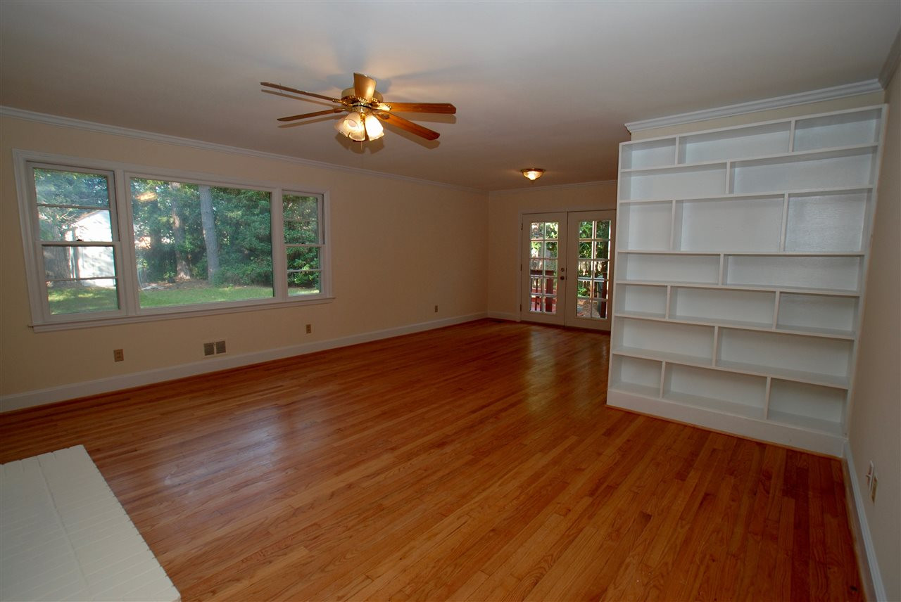 3404 Cherry Lane Raleigh, NC 27607 - Photo 8 of 19 Living room opens to dining room that leads to back deck and large yard Living Room