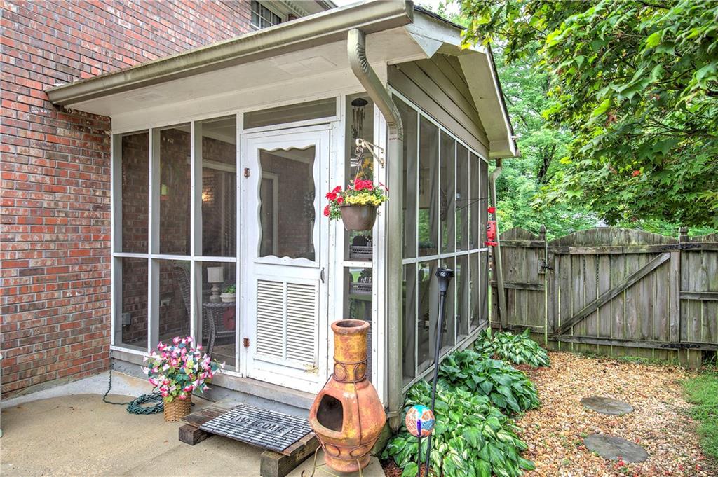 3637 Nebo Road Hiram, GA 30141 - Photo 62 of 63 a house with beautiful flower garden in front of it
