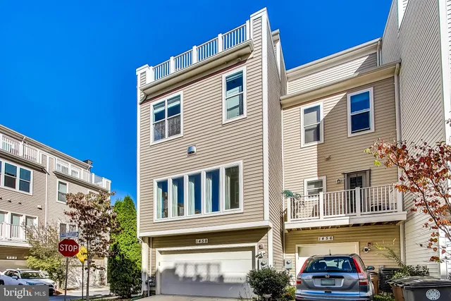 a picture of a bench in front of a wall