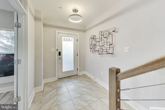 a view of an entryway with staircase