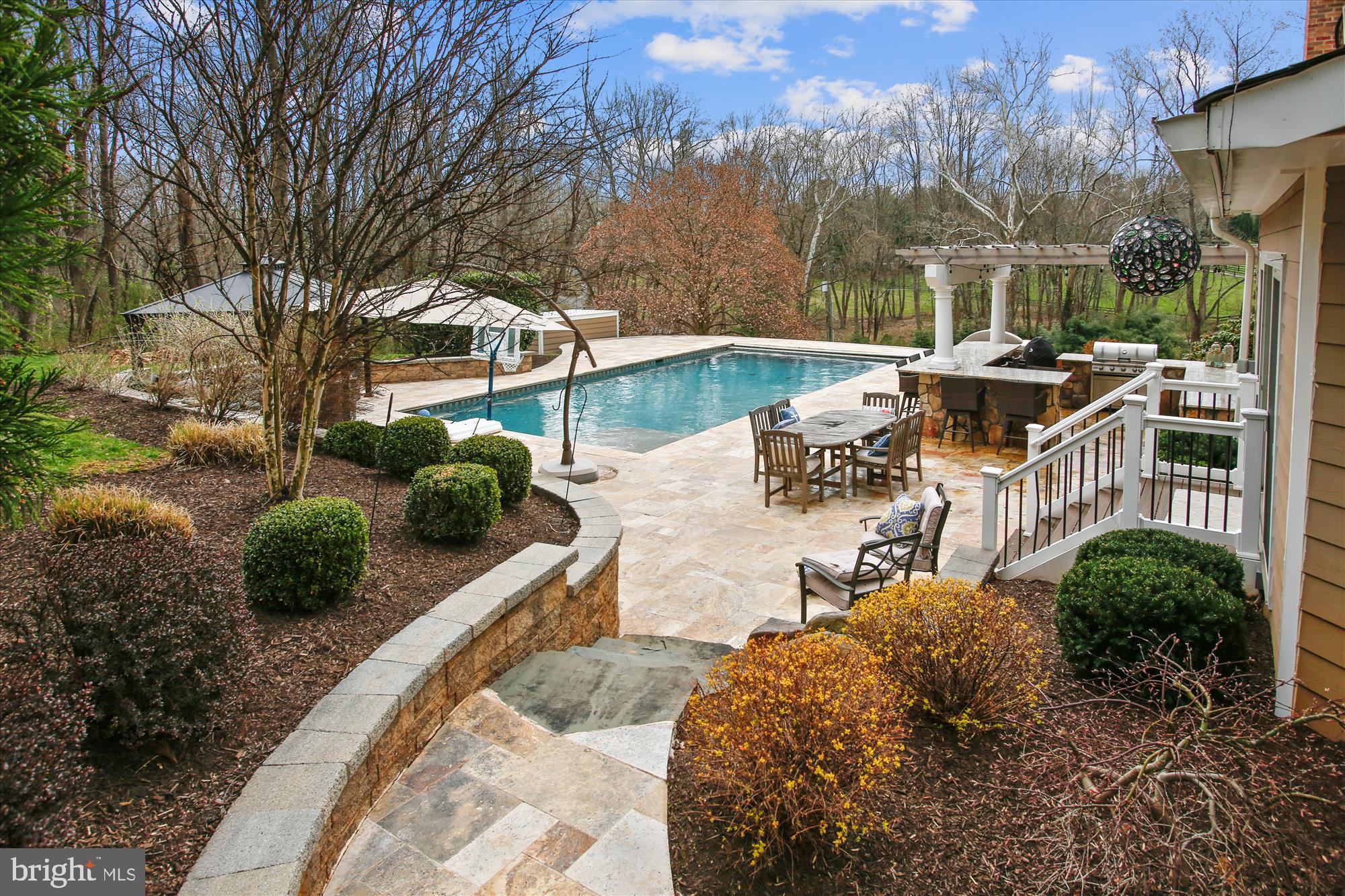 502 Walker Road Great Falls, VA 22066 - Photo 2 of 92 Stunning, heated salt water pool and outdoor bar
