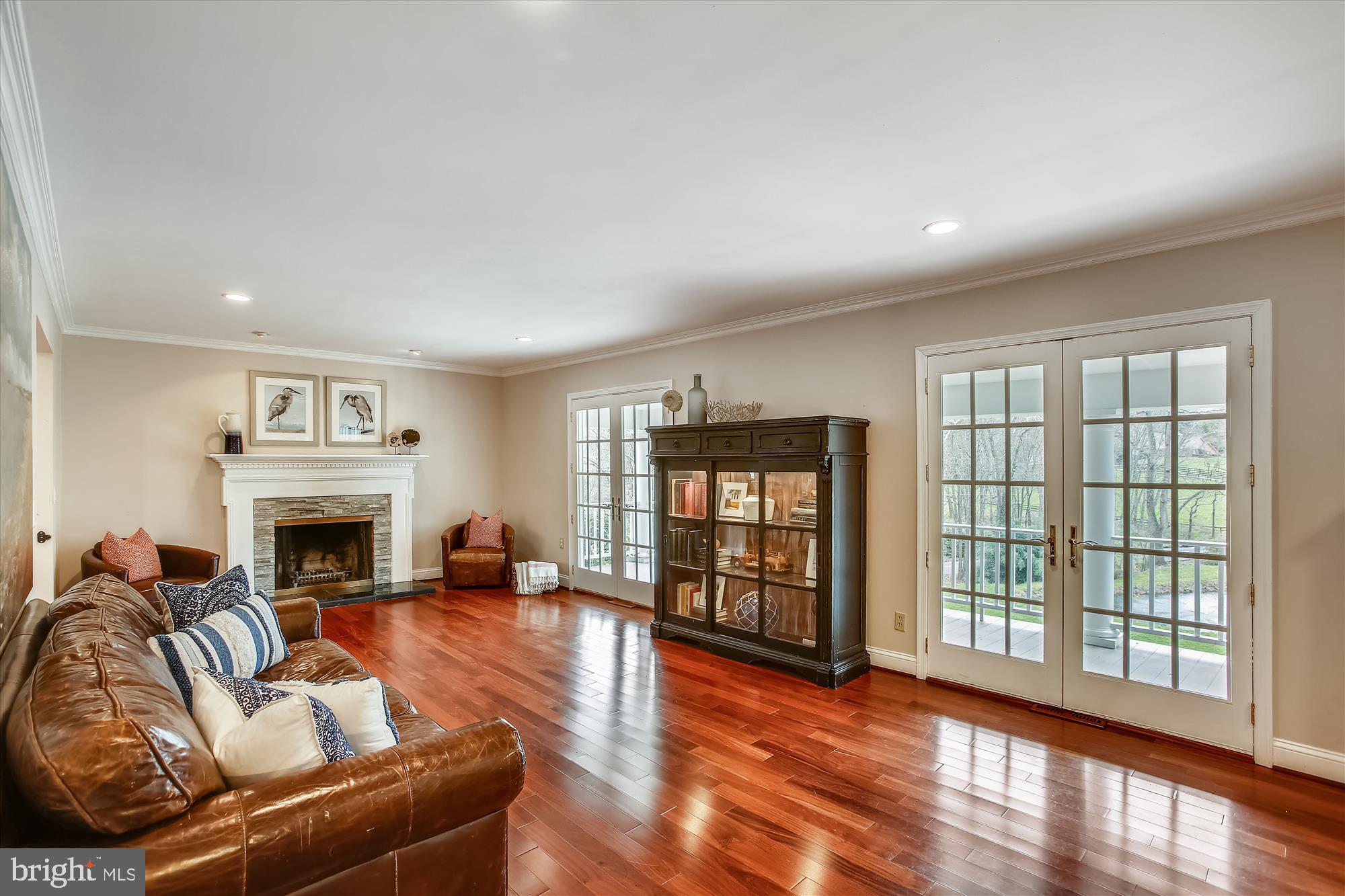 502 Walker Road Great Falls, VA 22066 - Photo 25 of 92 Gleaming cherry wood floors in living room