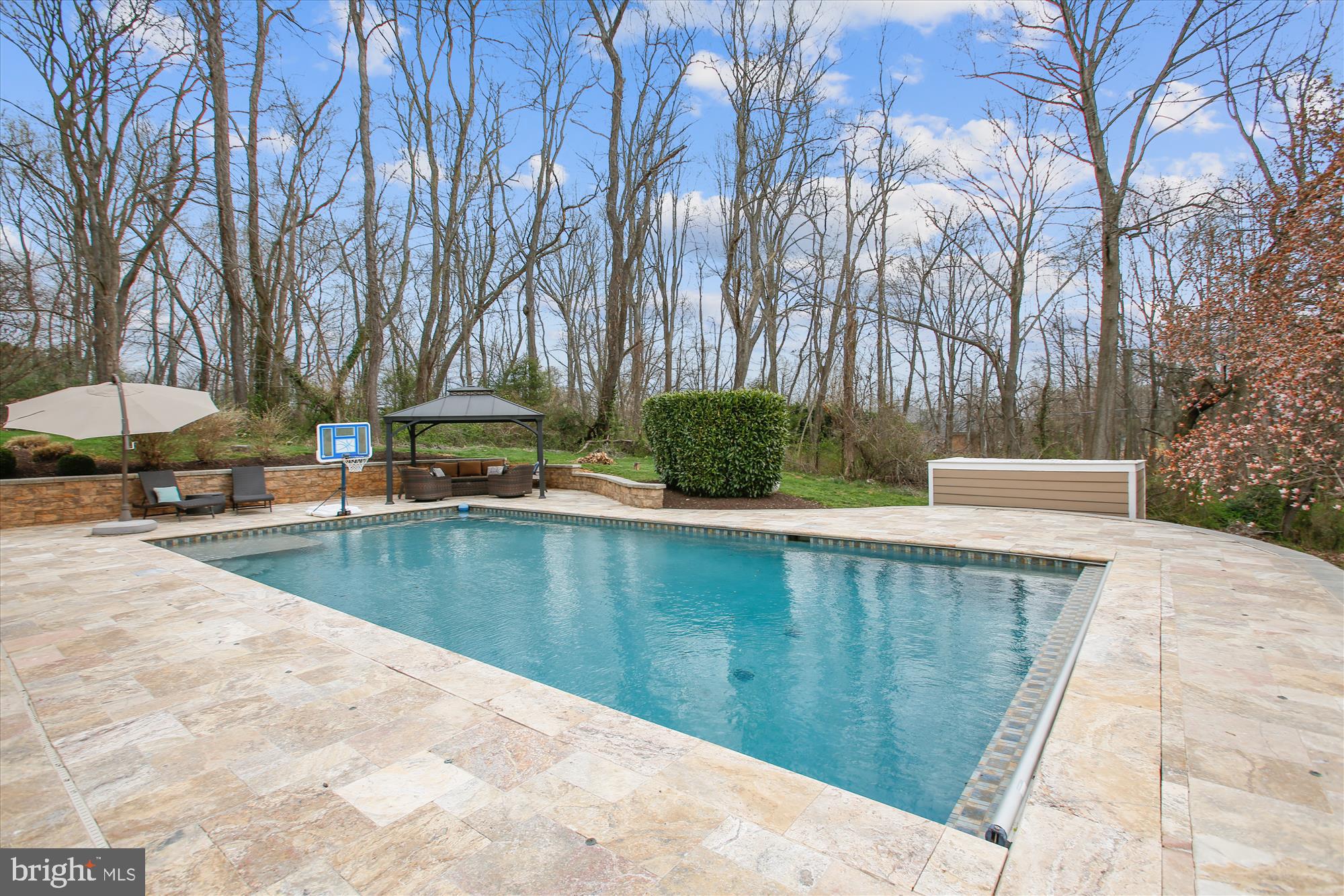 502 Walker Road Great Falls, VA 22066 - Photo 71 of 92 Pool is surrounded by gorgeous travertine tile