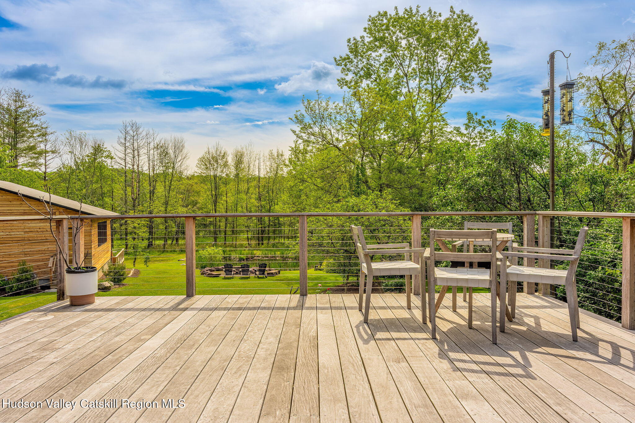 10 Harry Wells Road Saugerties, NY 12477 - Photo 22 of 58 a view of a balcony with wooden floor and iron fence