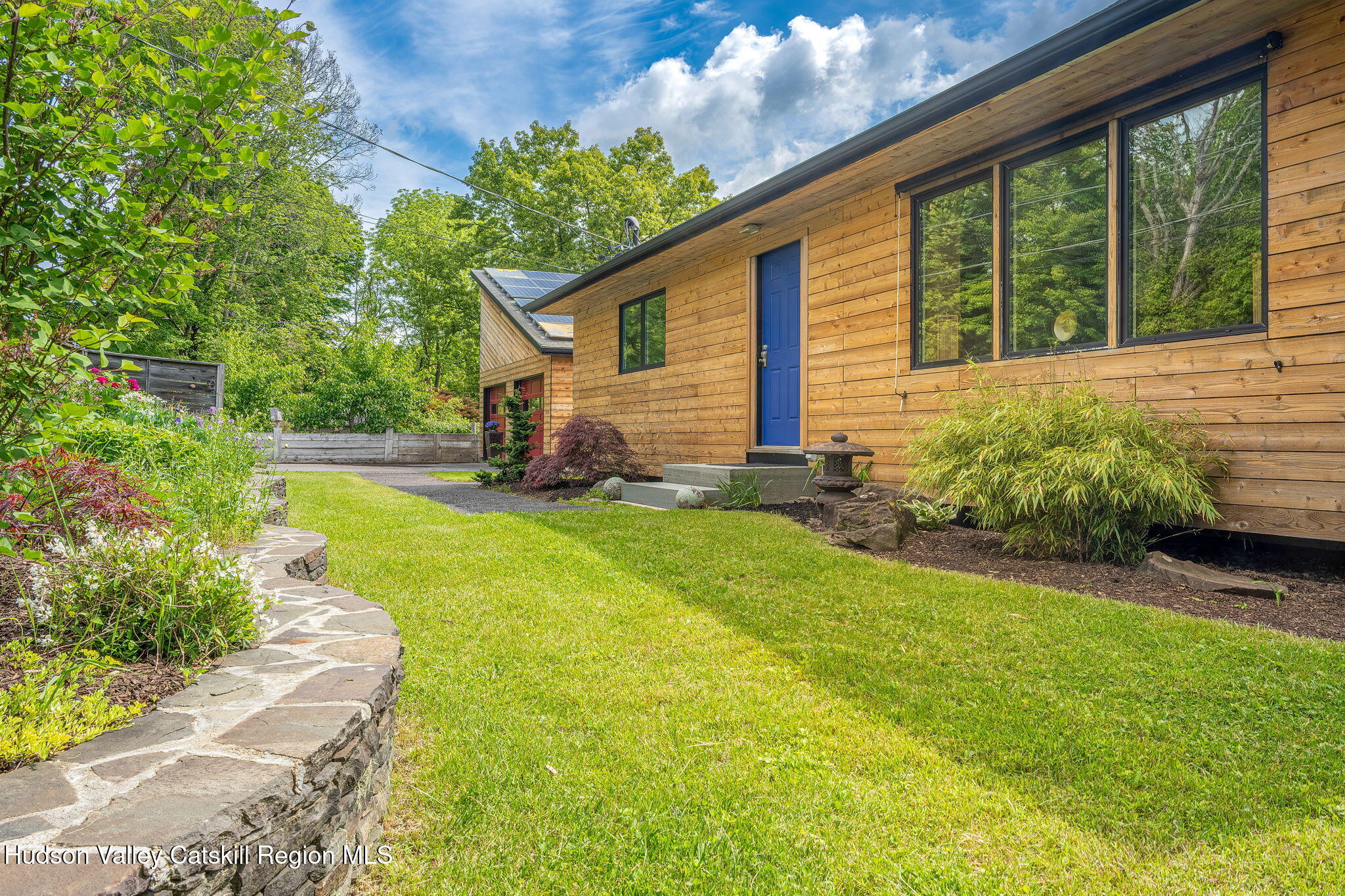 10 Harry Wells Road Saugerties, NY 12477 - Photo 24 of 58 a house view with a garden space
