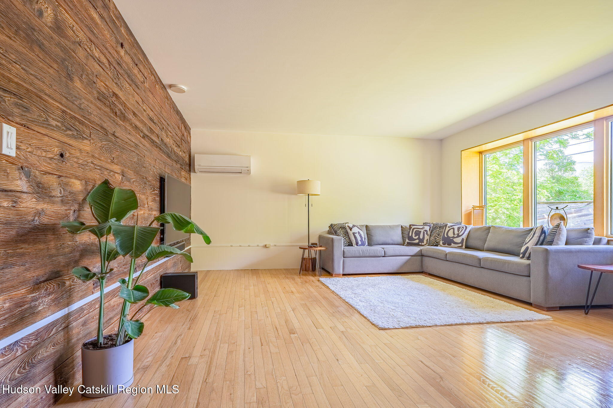10 Harry Wells Road Saugerties, NY 12477 - Photo 26 of 58 a living room with furniture and a large window