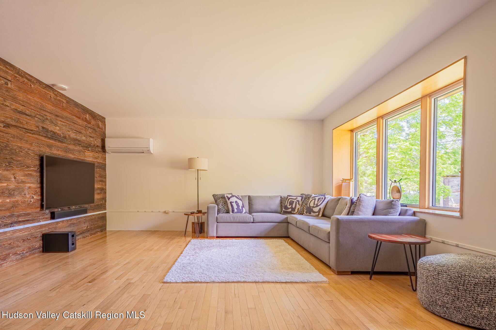 10 Harry Wells Road Saugerties, NY 12477 - Photo 28 of 58 a living room with furniture and a flat screen tv