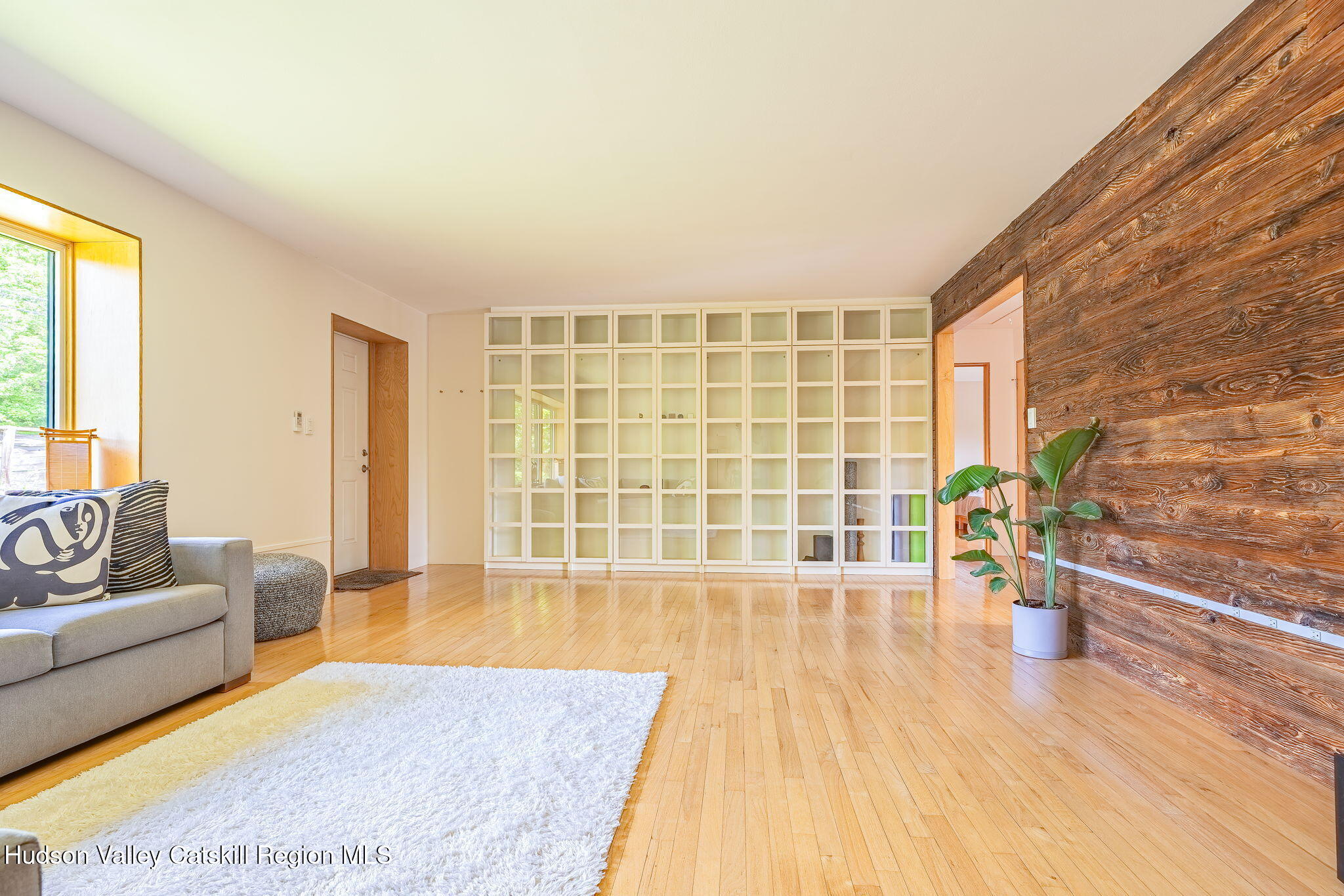 10 Harry Wells Road Saugerties, NY 12477 - Photo 29 of 58 a living room with furniture and wooden floor