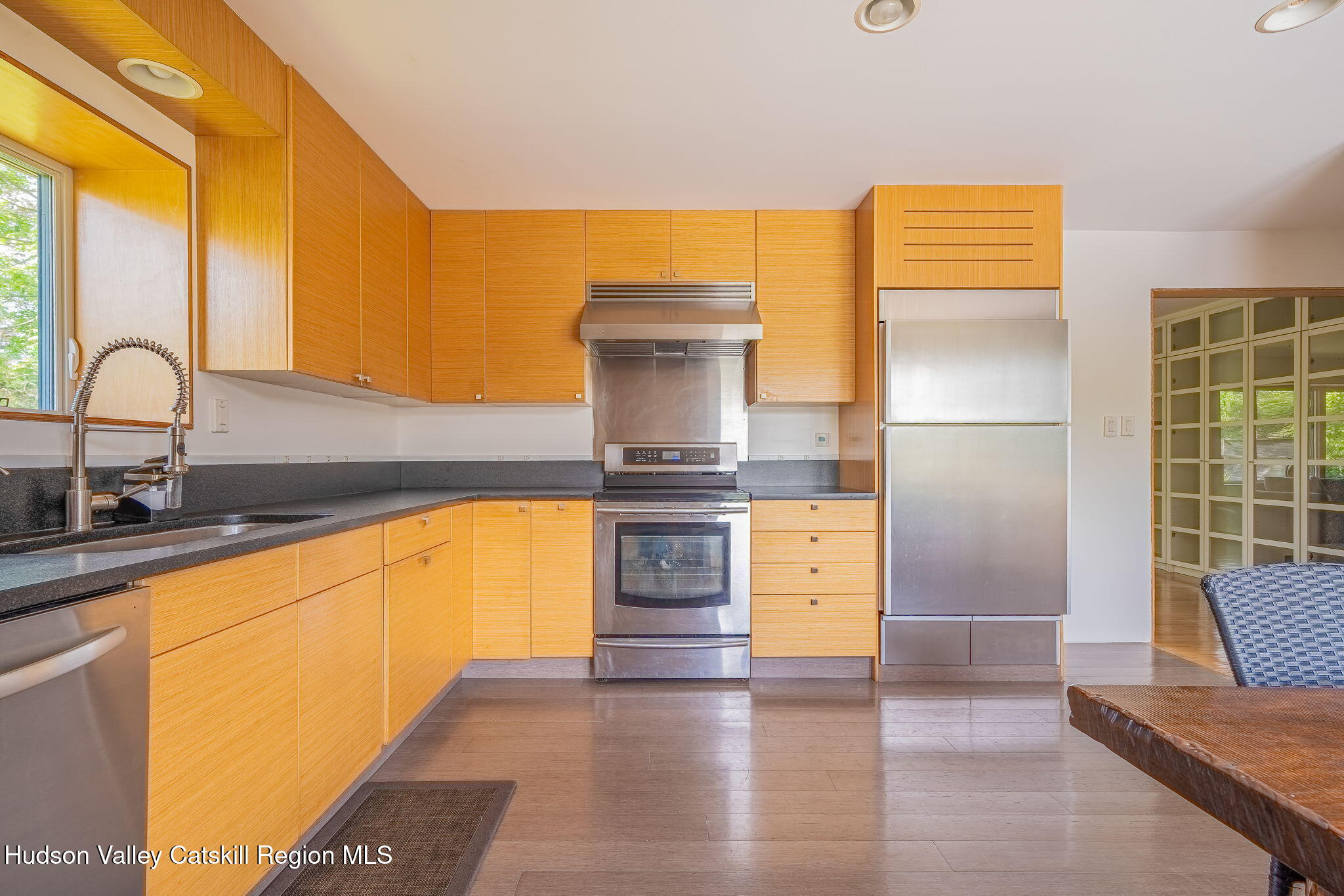 10 Harry Wells Road Saugerties, NY 12477 - Photo 34 of 58 a kitchen with a sink and a refrigerator