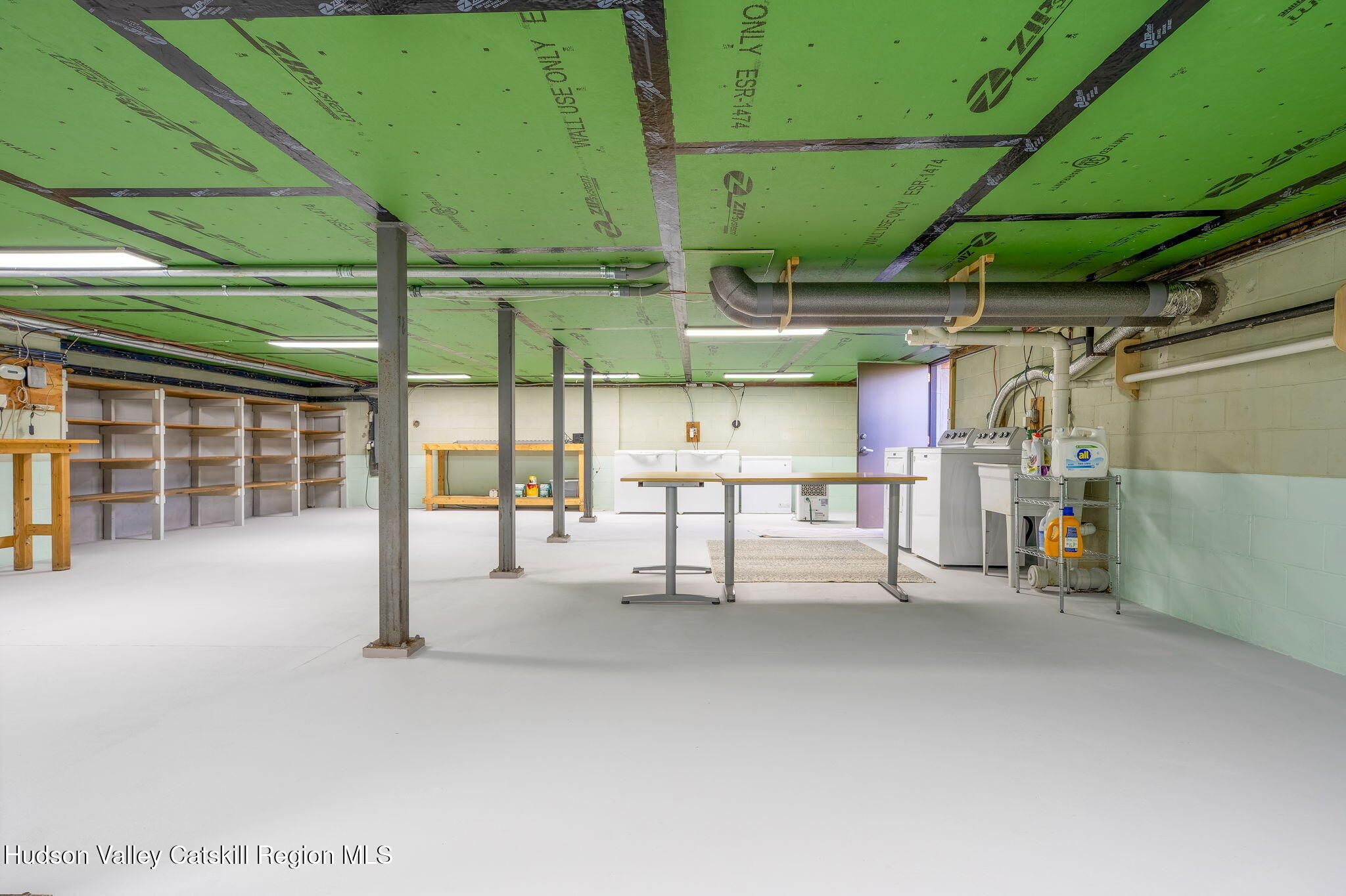 10 Harry Wells Road Saugerties, NY 12477 - Photo 48 of 58 a view of a room with racks on the wall