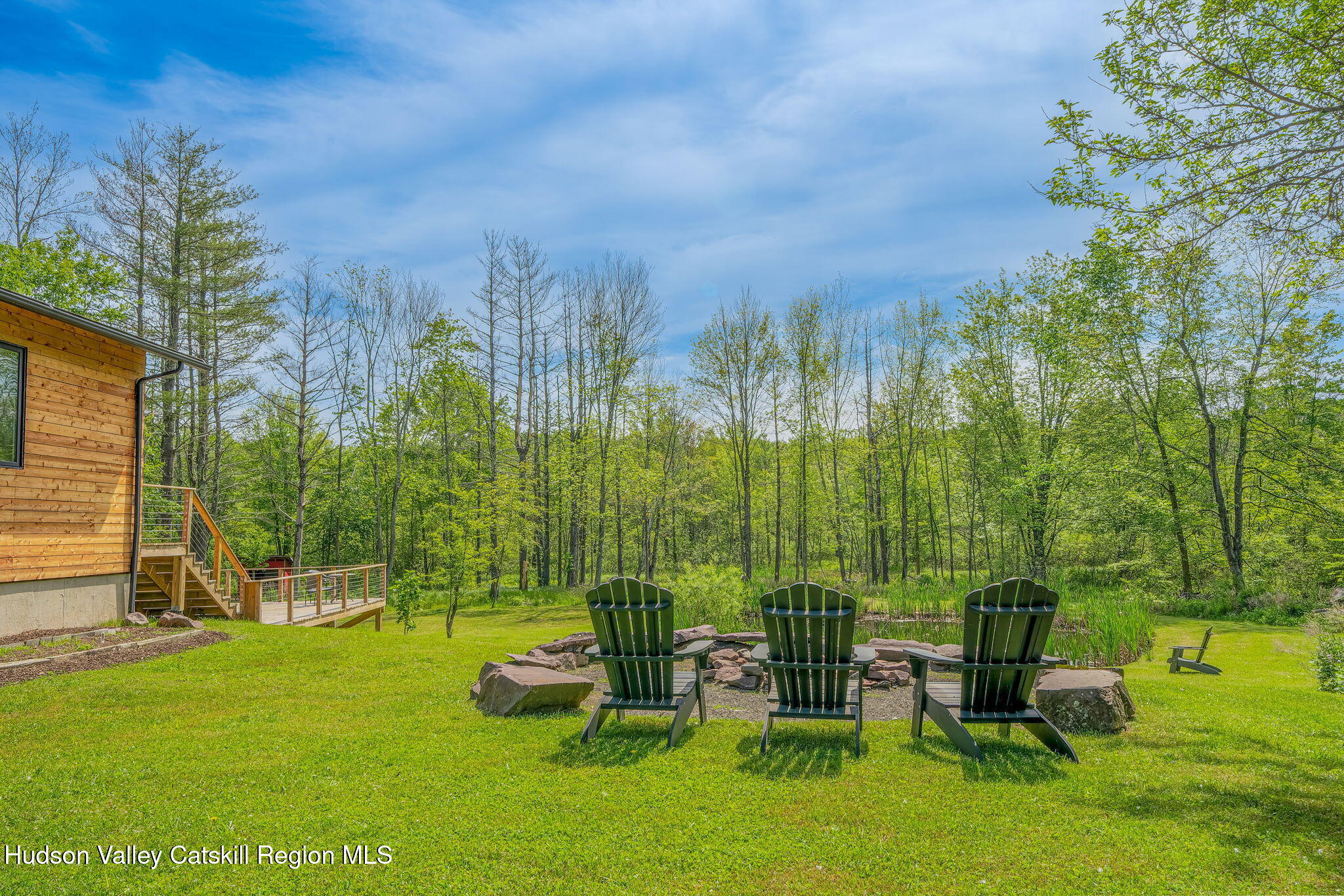 10 Harry Wells Road Saugerties, NY 12477 - Photo 52 of 58 a view of a garden with lawn chairs