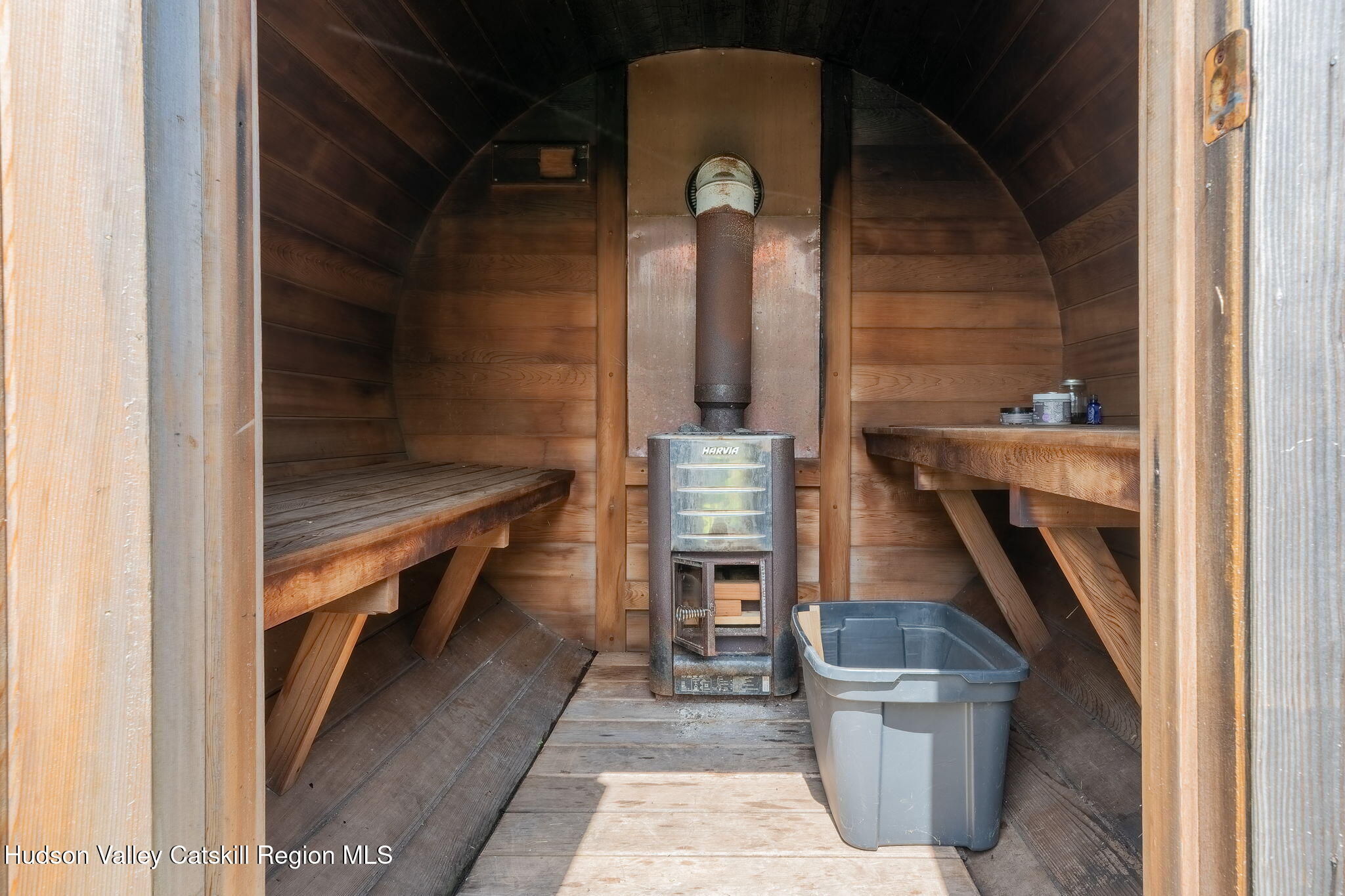 10 Harry Wells Road Saugerties, NY 12477 - Photo 55 of 58 a balcony with chairs and a stove