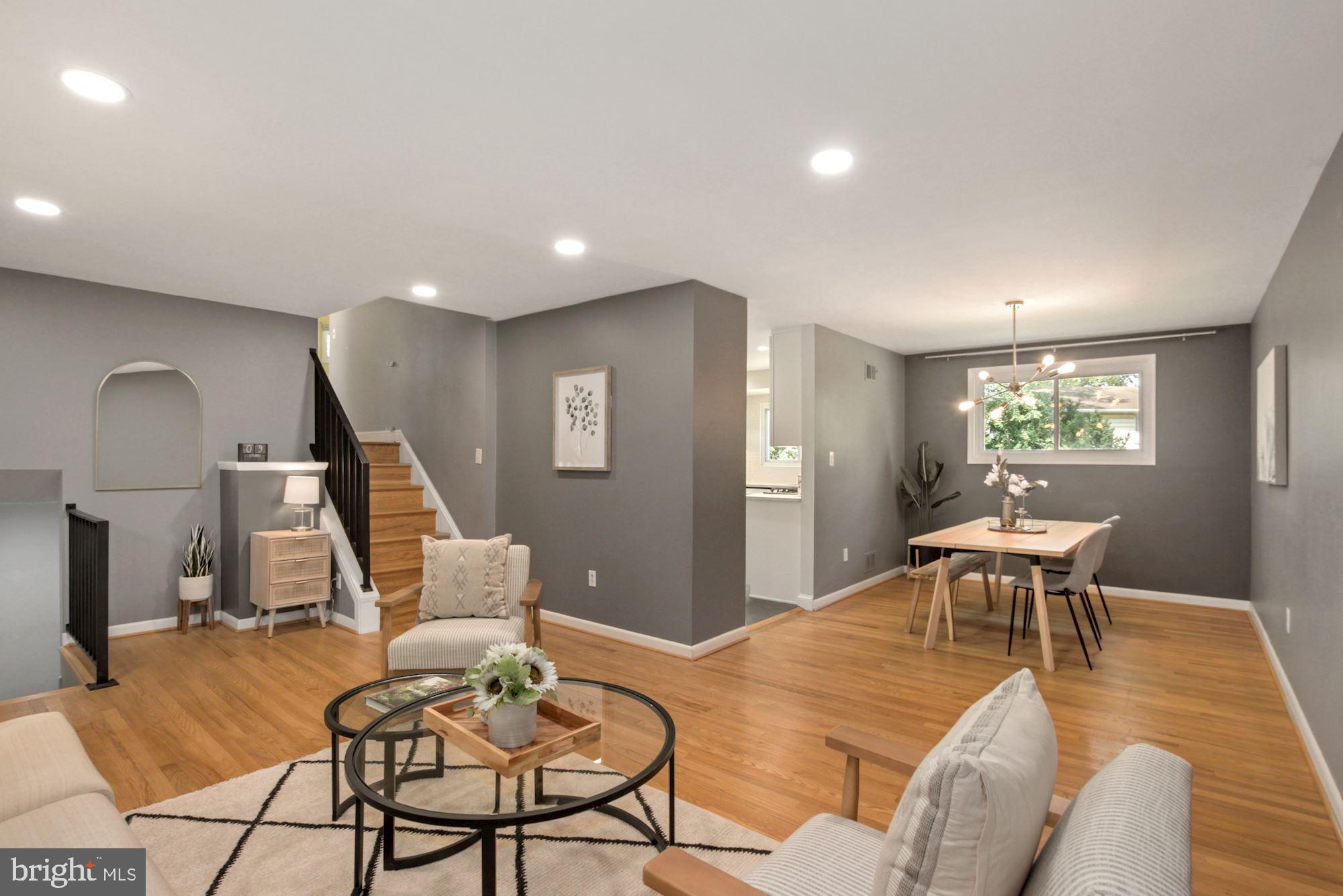 407 Hannes Street Silver Spring, MD 20901 - Photo 12 of 31 Living Room opens to Dining Room