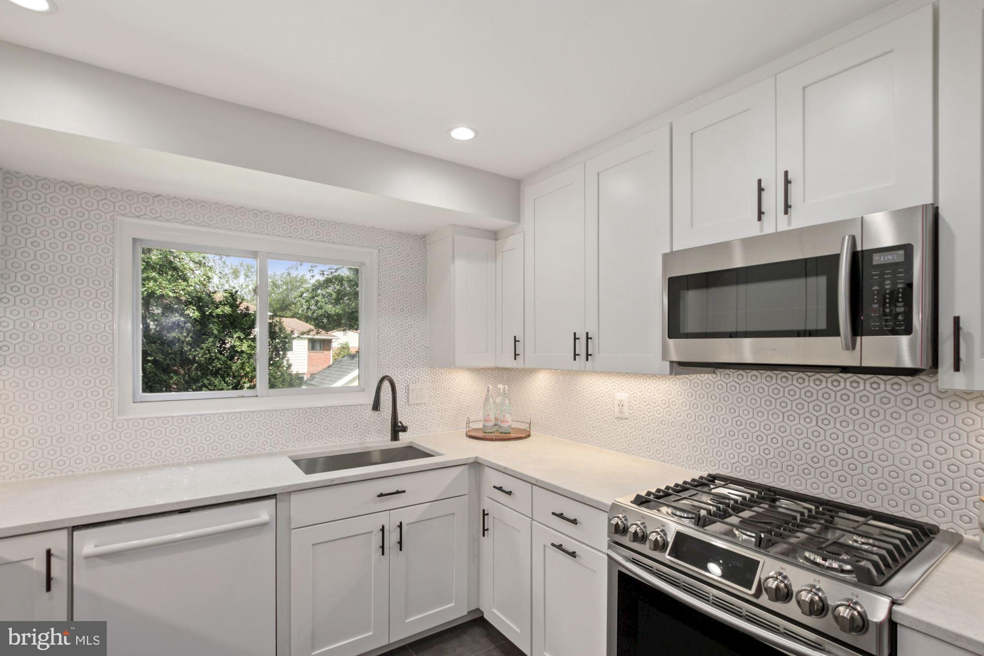 407 Hannes Street Silver Spring, MD 20901 - Photo 18 of 31 Gas stove and ample storage including pantry