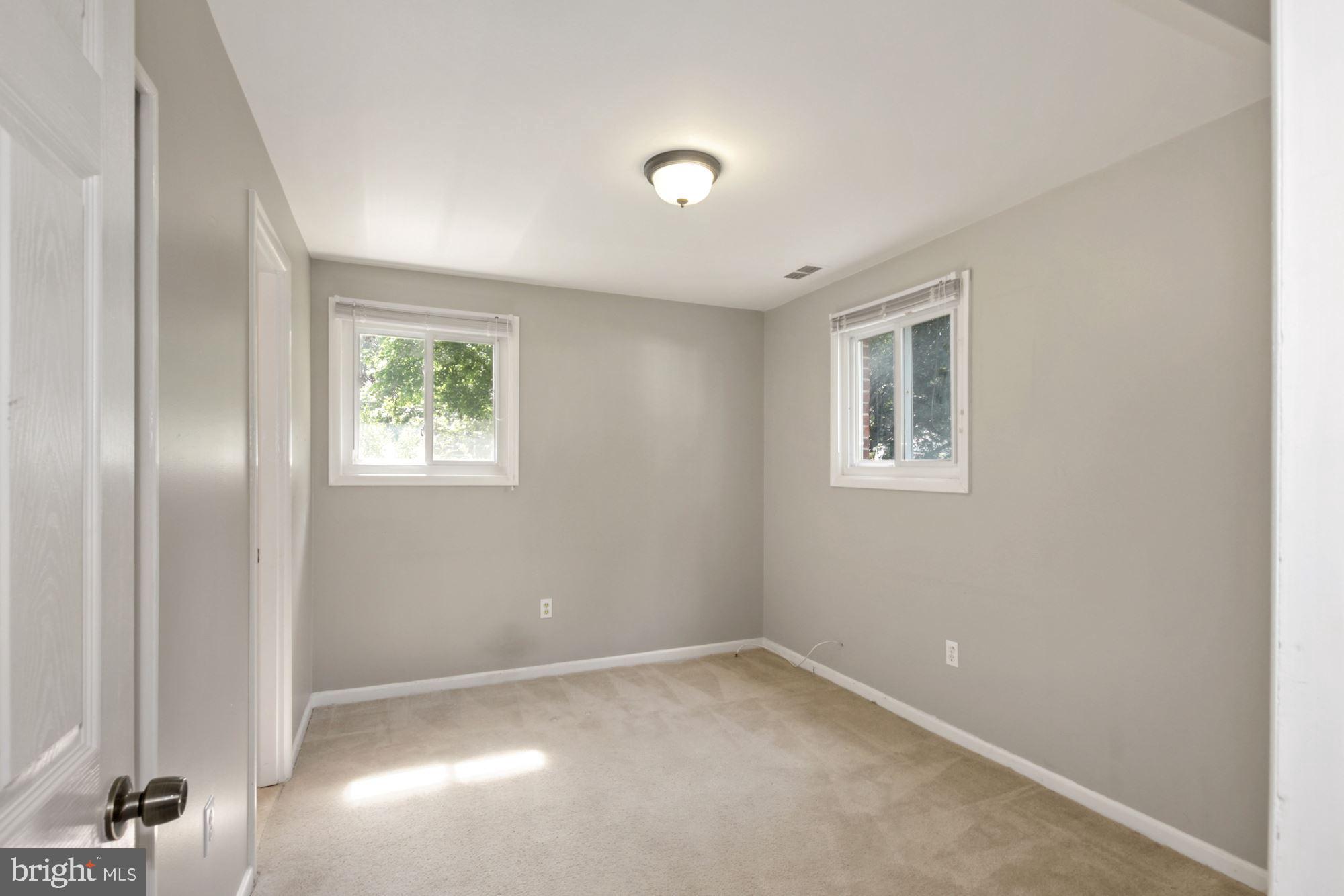 407 Hannes Street Silver Spring, MD 20901 - Photo 7 of 31 Main level bedroom or home office...