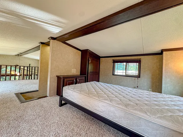 a view of balcony with furniture